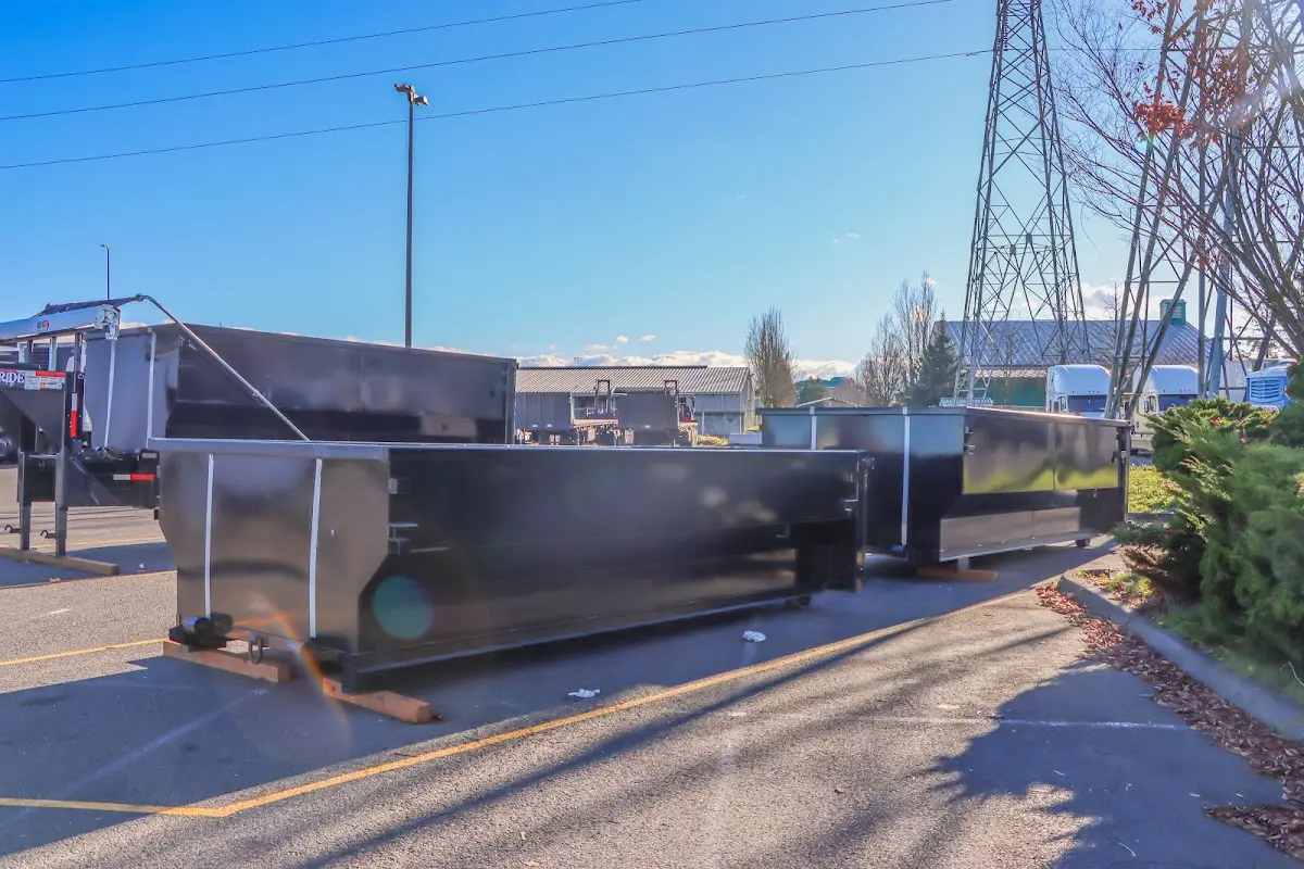 Roll-off dumpster ready for waste disposal at job site for Yard Waste Dumpster Rental in Elburn